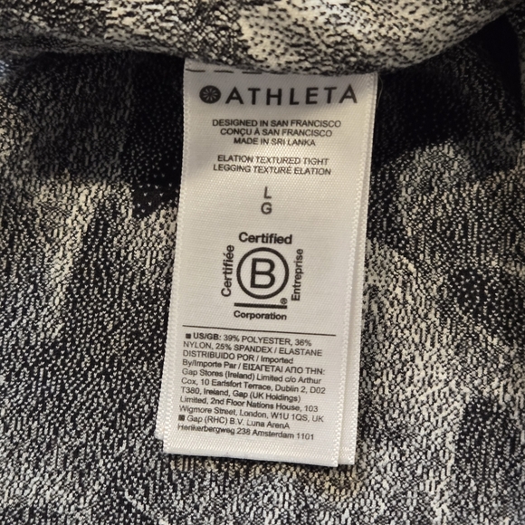 Athleta Salutation Stash Pocket 7/8 Legging in White & Black Floral Size L - Picture 9 of 10